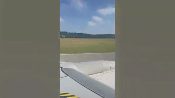 Airplane landing at KRK airport - Krakow, Poland